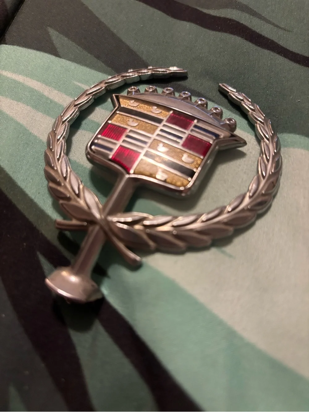 Cadillac crest hood